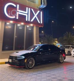 دۆج چارجەر